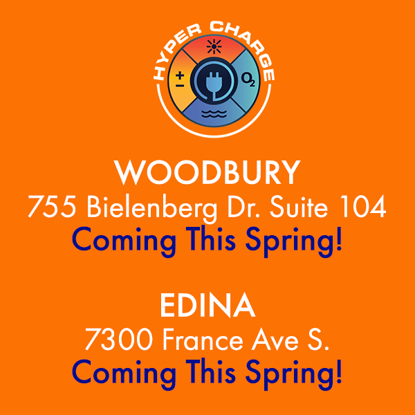 An orange background with the words woodbury 755 bieleberg dr suite 104