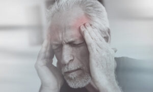 Man with migraine